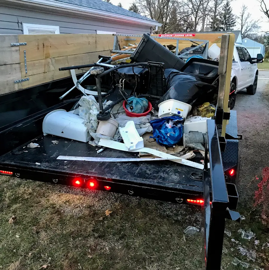 Roll-off dumpster delivered to a residential driveway in Enfield