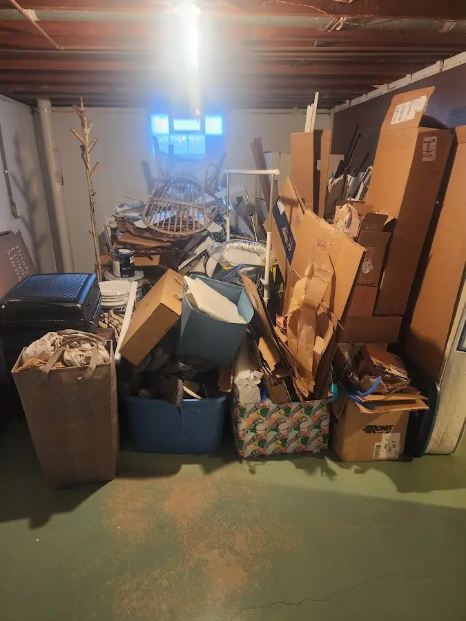 Roll-off dumpster container at job site for Yard Waste Dumpster Rental in Enfield